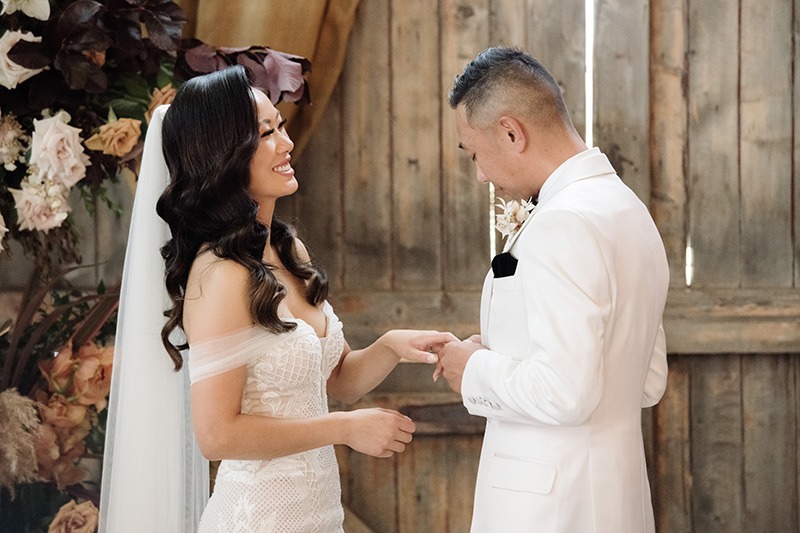 Couple exchanging rings at zonzo wedding