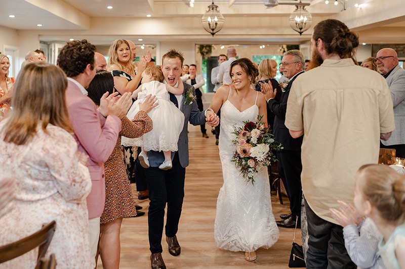 Family enter wedding reception at Yarra Valley wedding 